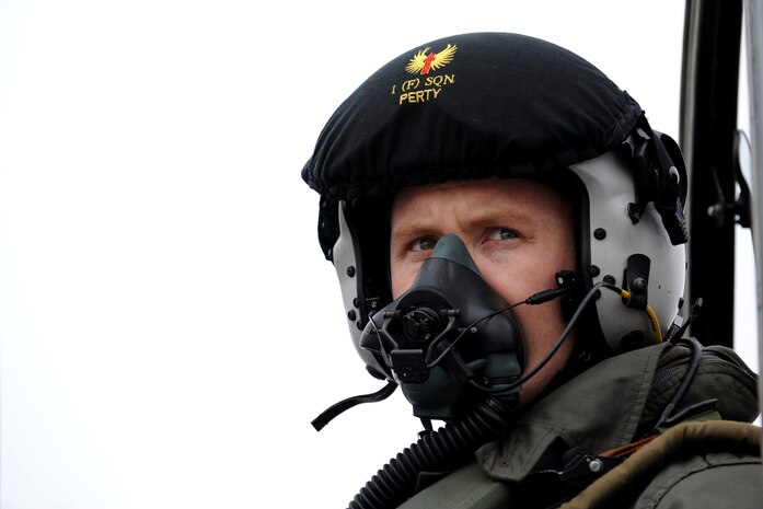 NELLIS AIR FORCE BASE, Nev. -- Flight Lieutenant Pert, A pilot from RAF Cottesmore, U.K. looks out to the runway before a training mission at Red Flag 10-3 Feb. 23, 2010. Red Flag is a realistic combat training exercise involving the air forces of the United States and its allies. The exercise is conducted on the 15,000-square-mile Nevada Test and Training Range, north of Las Vegas. (U.S. Air Force photo by Airman 1st Class Brett Clashman/RELEASED)