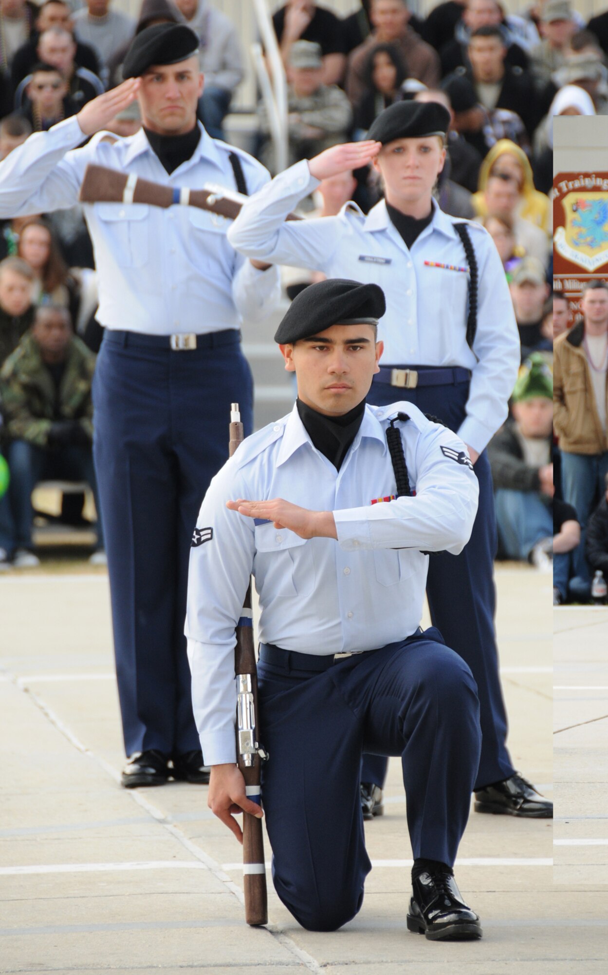 From left, Airmen 1st Class George Burgess and Steven Perez and Airman Basic Katherine Coulstring, 332nd TRS, conclude their freestyle routine.  (U.S. Air Force photo by Kemberly Groue)