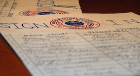 Sign-in sheets for an American Military Retirees Association meeting held at the Charleston Club here Feb. 20 track the number of people in attendance. The meeting drew approximately 20 to hear about the AMRA's objectives and intent to start a new South Carolina chapter. The AMRA was started in 1973. (U.S. Air Force photo/Staff Sgt. Daniel Bowles)