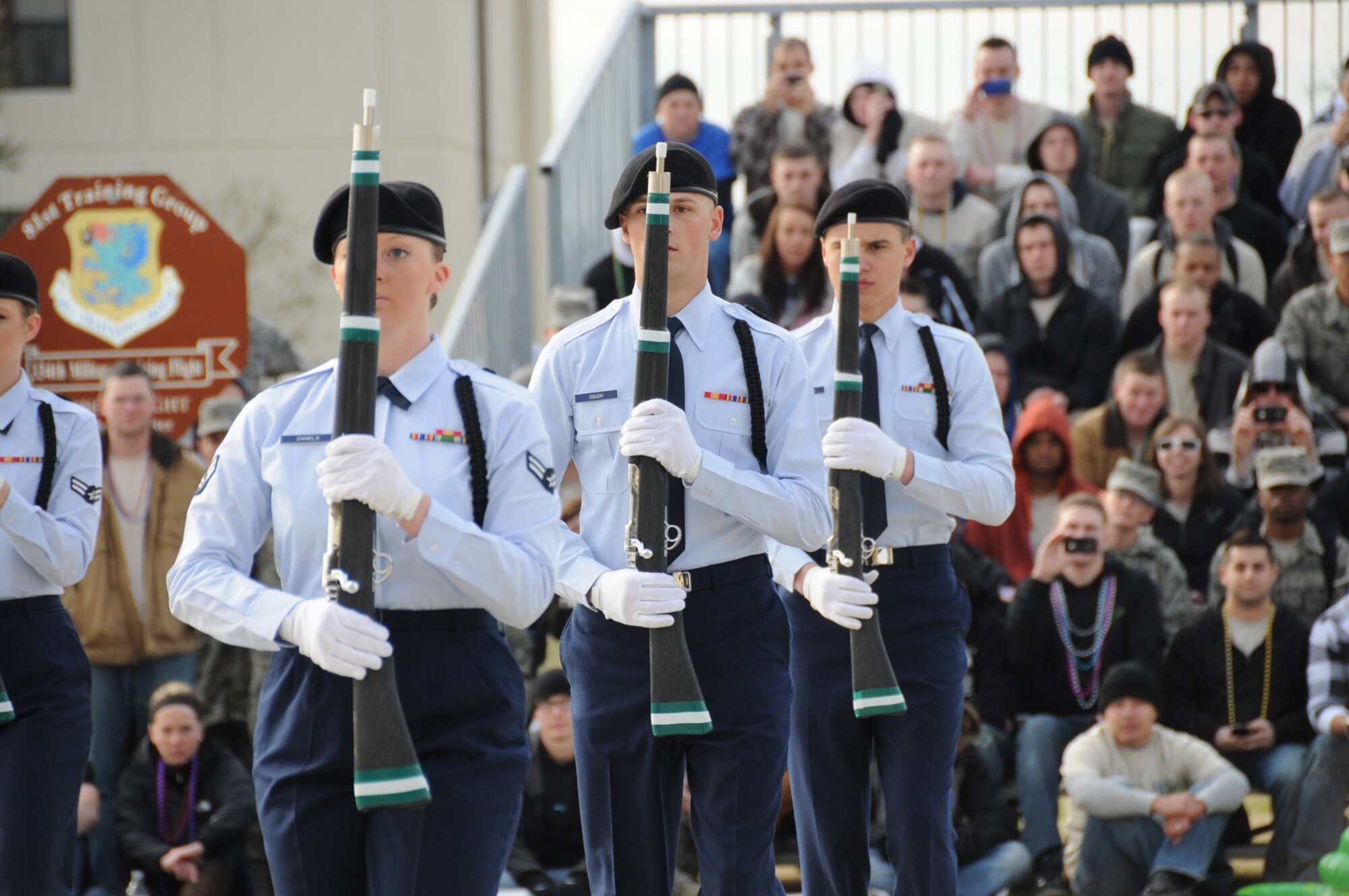 From left, Airman 1st Class Dustie Daniels and Airmen Basic Wesley Couch and Devin Gonzalez, 334th Training Squadron, perform during the freestyle competition during the 81st Training Group’s first drill down of the season Friday. The Gators placed first in all three categories — regulation drill, open ranks and freestyle drill.  (U.S. Air Force photo by Kemberly Groue)