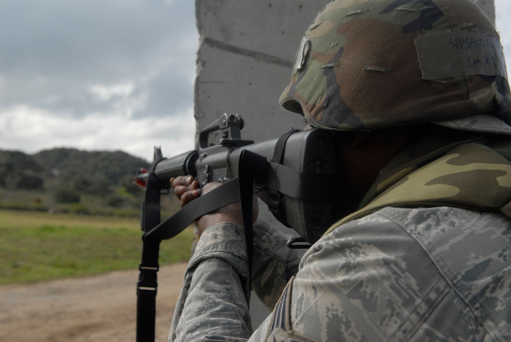 VANDENBERG AIR FORCE BASE, Calif. -- Firing away, Senior Airman Torrence Safford, a member of the 30th Civil Engineer Squadron, identifies the enemy and shoots back during a North Star exercise here Friday, Feb. 19, 2010. At North Star, Airmen are taught to positively identify the enemy during an attack before firing their weapon. (U.S. Air Force photo / Senior Airman Ashley Reed)