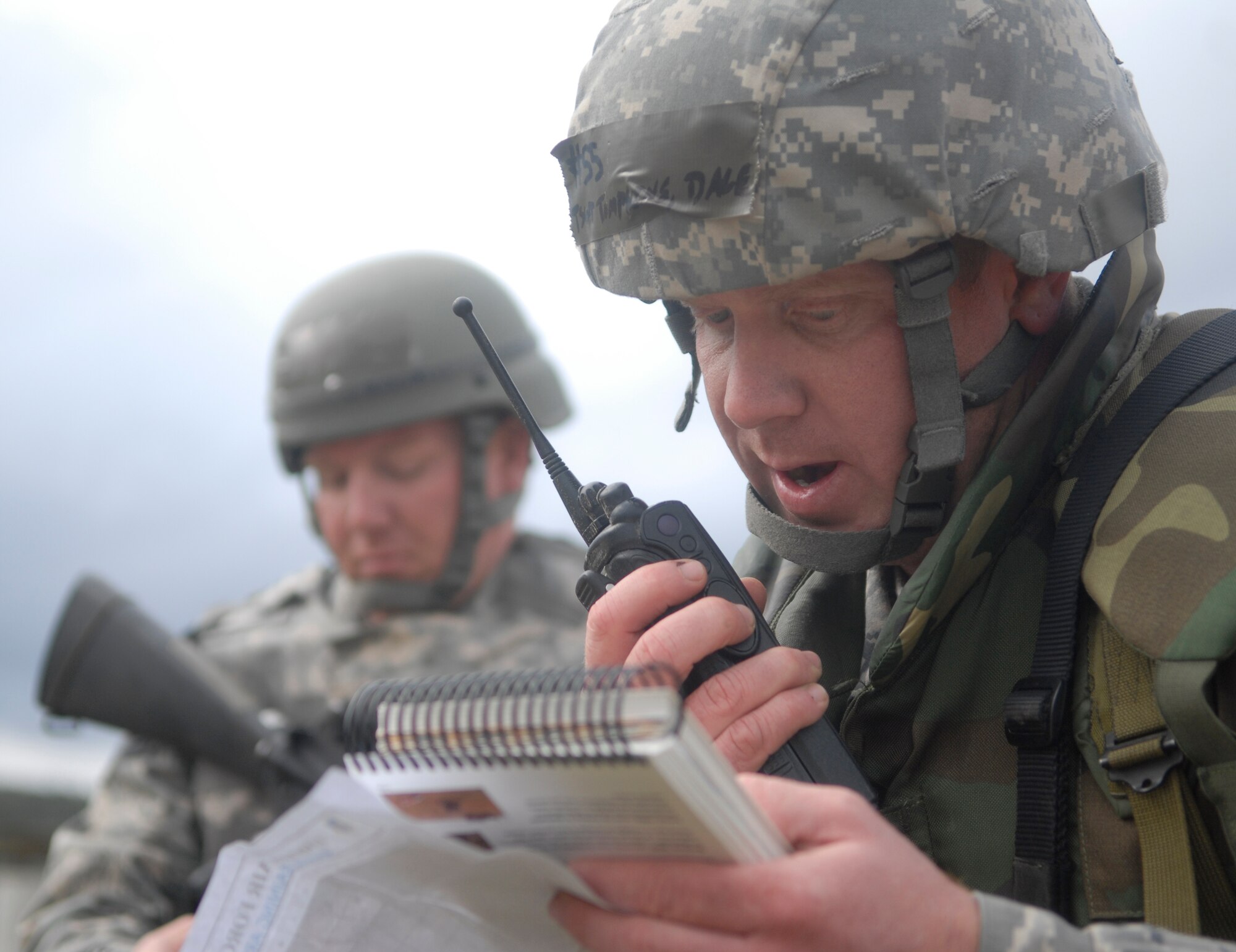 VANDENBERG AIR FORCE BASE, Calif. -- Tech. Sgt. Dale Tompkins, a member of the 30th Civil Engineer Squadron, reports an unexploded ordnance at the North Star exercise site here Friday, Feb. 19, 2010. After the UXO was discovered, it was cordoned off and reported. (U.S. Air Force photo/Senior Airman Ashley Reed)
