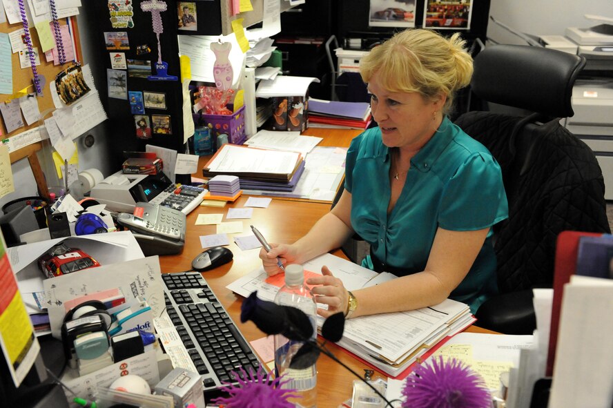 SHAW AIR FORCE BASE, S.C. -- Ms. Val Davis, 20th Medical Support Squadron procurement technician, processes doumentation. Ms. Davis earned the 20th Fighter Wing's category 1 civilian of the year honors. (U.S. Air Force photo/Airman 1st Class Neil D. Warner)