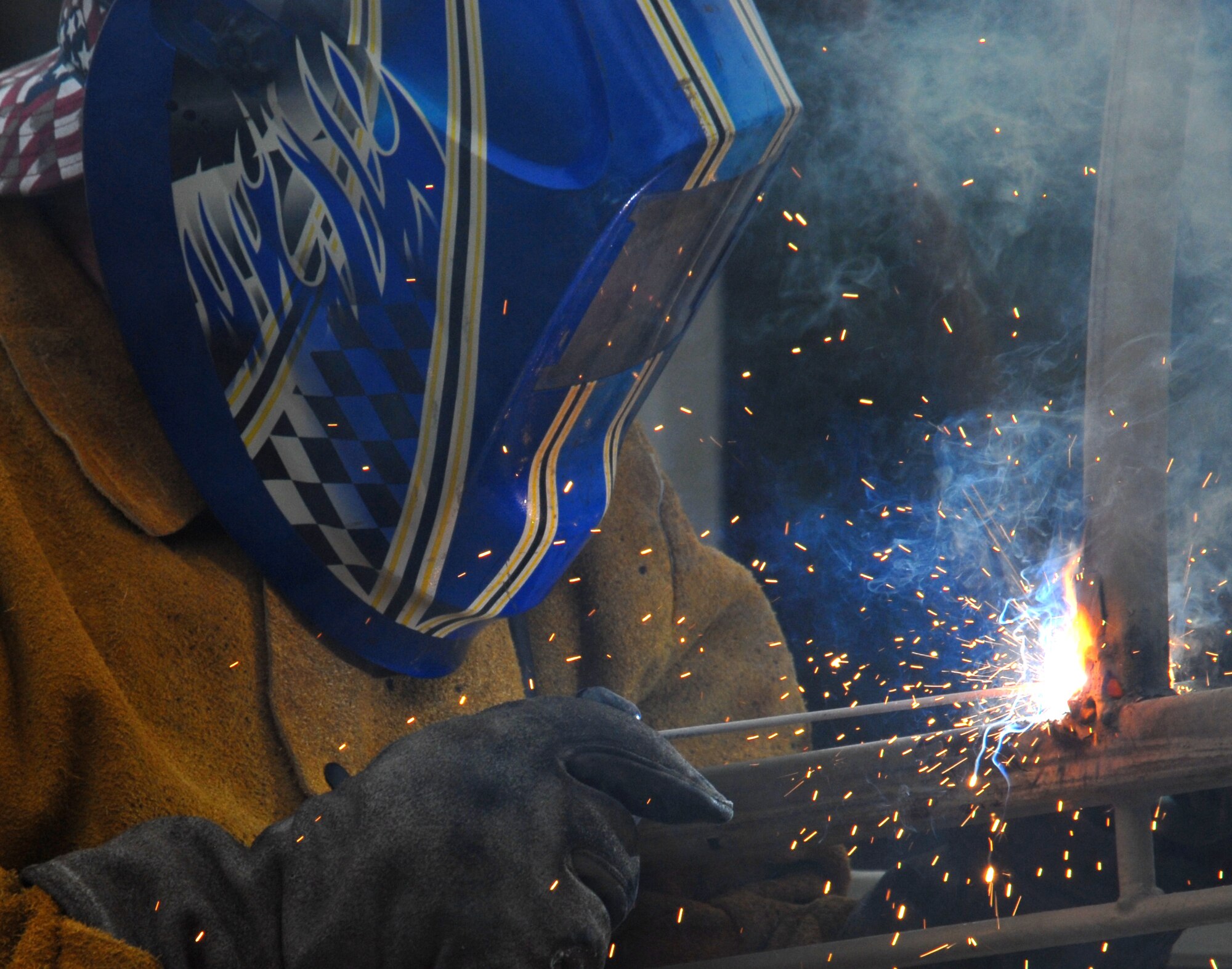 EGLIN AIR FORCE BASE, Fla. -- A construction worker welds the steel frame of the Eglin Conference Center walkway canopy, Feb. 24. The canopy will receive repairs before it is recovered. (U.S. Air Force photo/ Airman 1st Class Anthony Jennings)