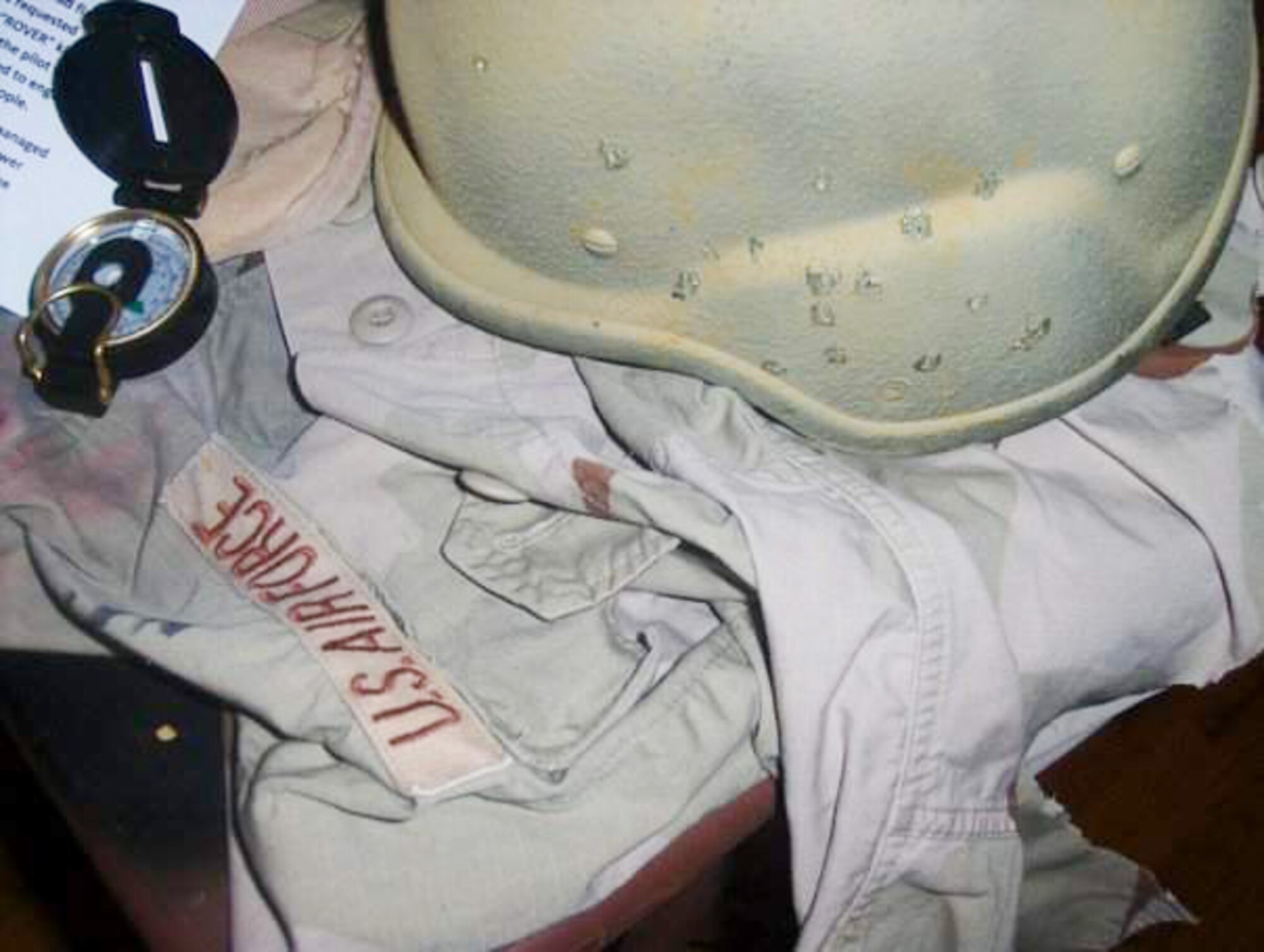 Lt. Col. Greg Harbin's helmet and uniform after the rocket-propelled grenade attack in Afghanistan. (Courtesy photo)