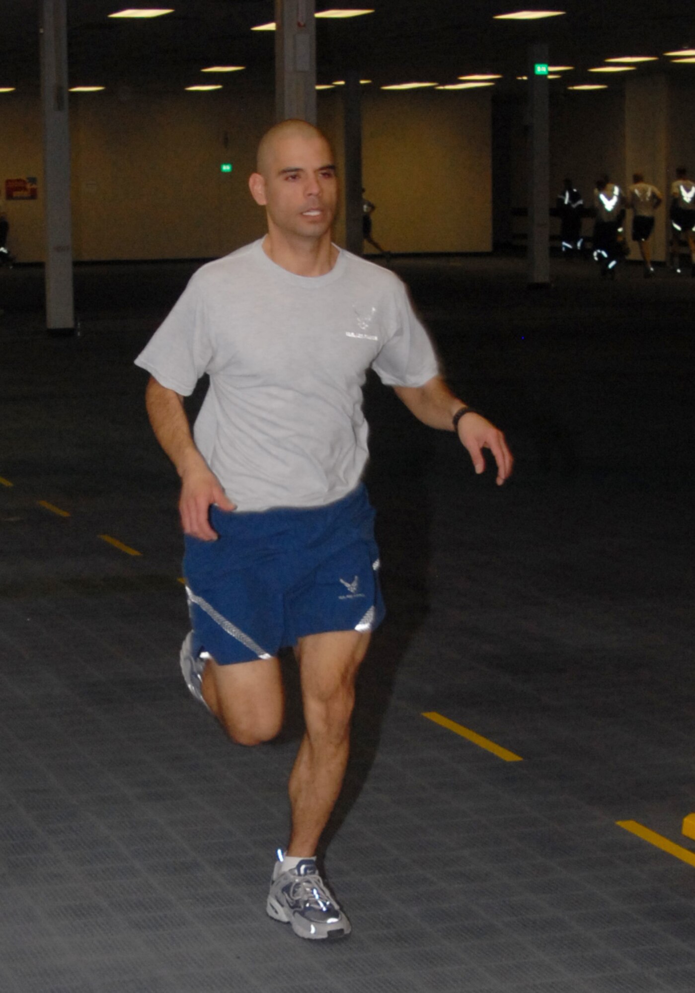 Tech. Sgt. Manuel Zubia, NCOIC Total Force Service Center - Denver Project Manager, runs here Feb. 23 as part of the Air Reserve Personnel Center fitness program. (U.S. Air Force photo by Dwayne Beuthel.)