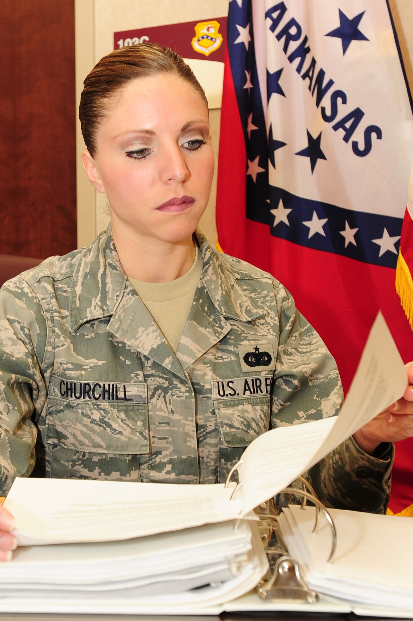 Master Sgt. Jillian Churchill, 189th Mission Support Group knowledge operations manager, reviews plans Feb. 24 on base. Sergeant Churchill is vital to the 189th Airlift Wing where she has been noted as an active and visible leader while performing daily tasks and staying involved with base functions. (U.S. Air Force photo by Senior Airman Steele C. G. Britton)