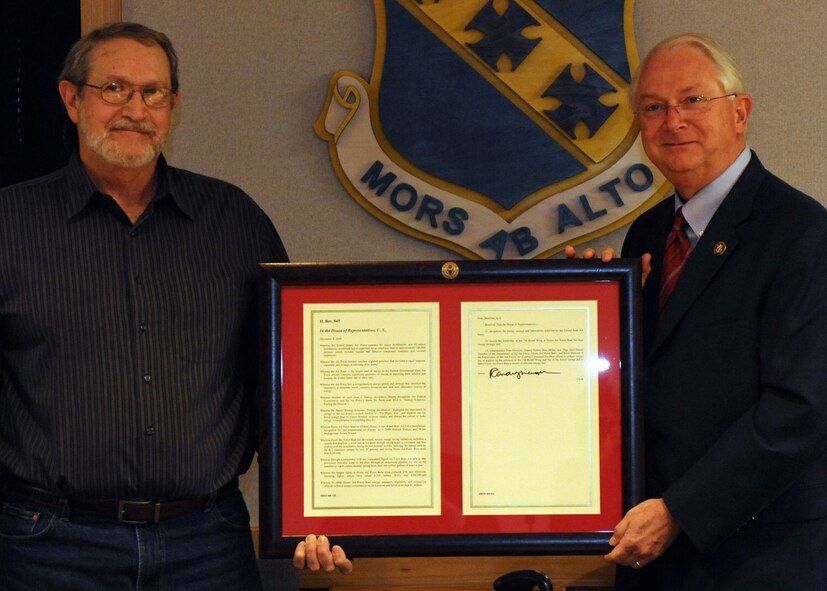 DYESS AIR FORCE BASE, Texas –  Texas Congressman Randy Neugebauer presented Danny Dobbs, George Denslow, Staff Sgt. Daniel Thatcher and Ronald Miller with the Department of Energy’s Federal and Water Management Award here Feb. 22. In 2008 Dyess Air Force Base was able to save more than 160 million gallons of water and reduced energy consumption by 16.5 percent saving more than $1 million. The award, sponsored by the Department of Energy's Federal Energy Management Program, is given annually to recognize outstanding contributions toward increased energy efficiency, renewable energy and water conservation within the federal sector. 