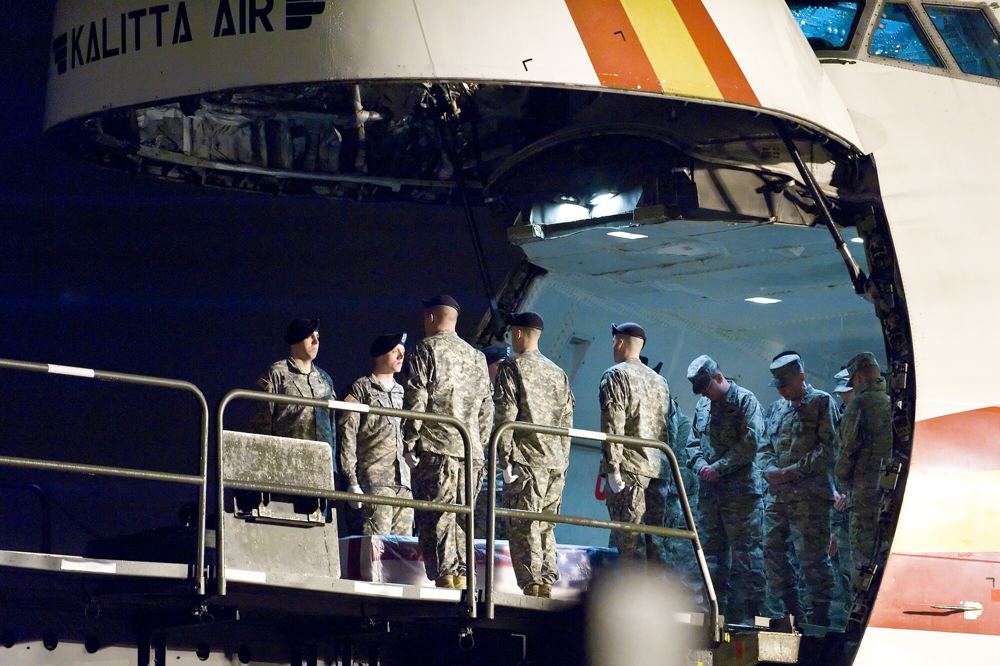A U.S. Army carry team transfers the remains of Army Pfc. JR Salvacion, of Ewa Beach, Hawaii, at Dover Air Force Base, Del., February 22. (U.S. Air Force photo/Roland Balik)