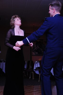 ELLSWORTH AIR FORCE BASE, S.D. -- Col. Robert Ritter, 28th Medical Group commander, dances with his wife Janet during the 28th Bomb Wing Winter Formal, Feb. 20. The U.S. Air Force Heartland of America Band "Night Wing" performed music during the event. (U.S. Air Force photo/Airman 1st Class Anthony Sanchelli)
