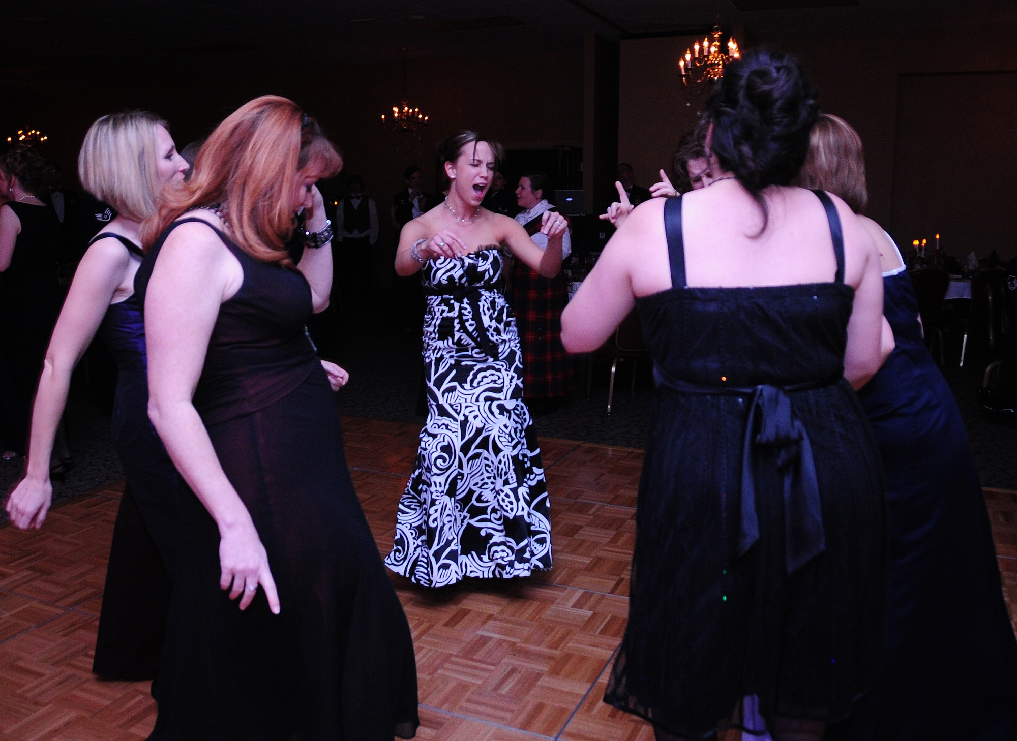 ELLSWORTH AIR FORCE BASE, S.D. -- Guests get down and boogy during the 28th Bomb Wing Winter Formal, Feb. 20.  The U.S. Air Force Heartland of America Band "Night Wing" performed music during the event. (U.S. Air Force photo/Airman 1st Class Anthony Sanchelli)
