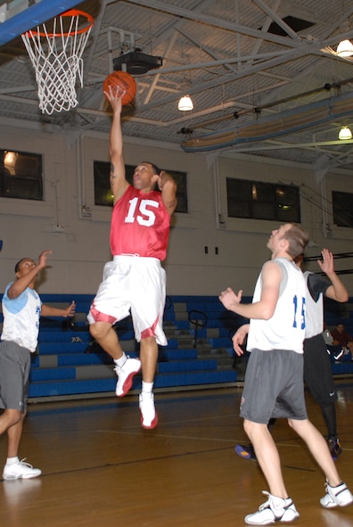 Felix Cruz, 436th FSS power forward, sinks one for two points during an intramural basketball game against the 3rd AS.  The 436th FSS defeated 3rd AS 52 ? 48. (U.S. Air Force photo/Staff Sgt. Chad Padgett)