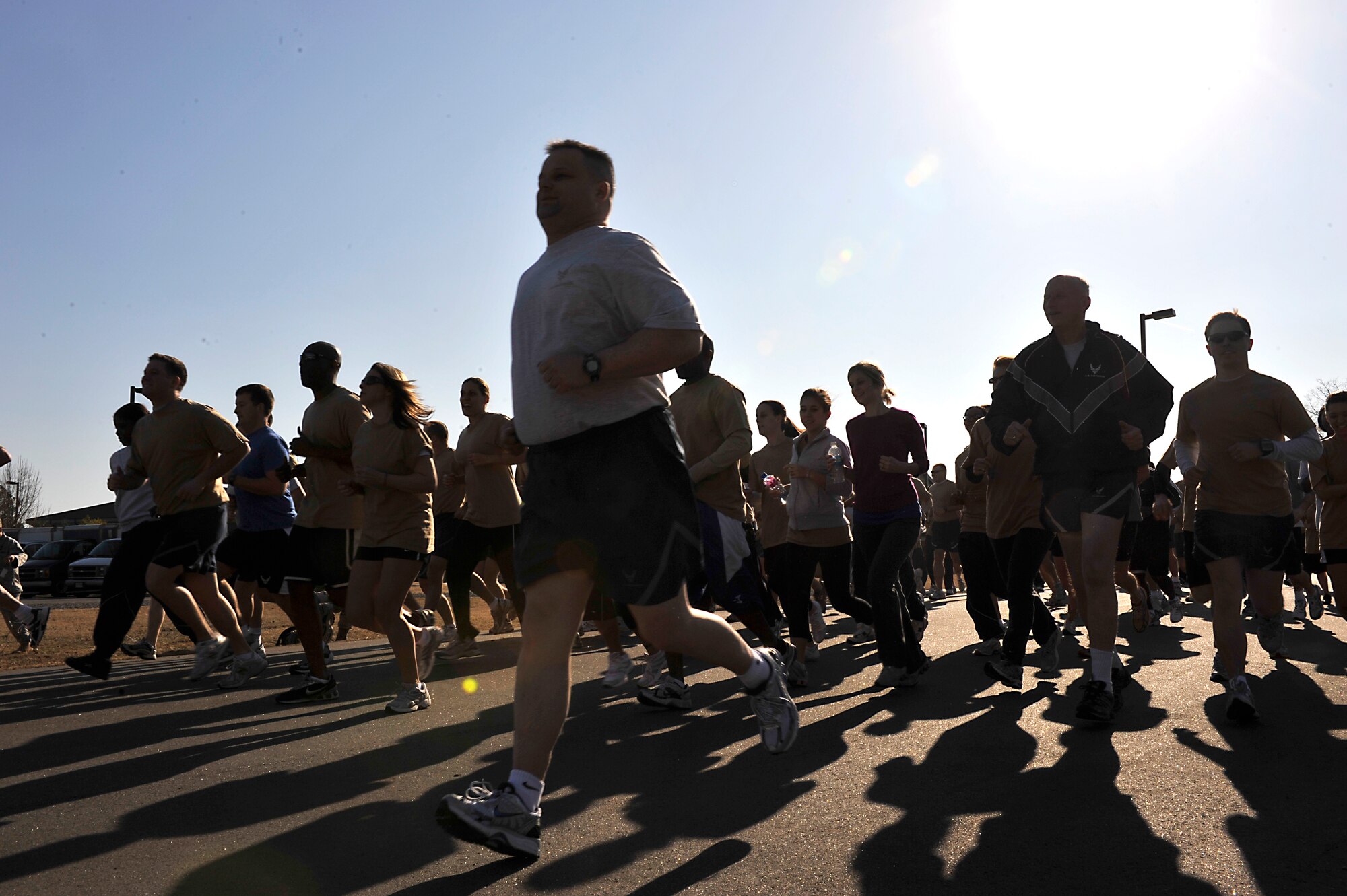 Little Rock Air Force Base Airmen begin the 5K Haiti Relief Run Feb. 19 at full speed on base. The 5K Haiti Relief Run had 444 registered participants, but welcomed all Airmen to join in the relief effort. (U.S. Air Force photo by Senior Airman Christine Clark)
