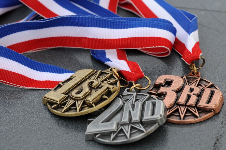 Medals sit on a table until the end of the Winterathlon Saturday, Feb. 20, 2010.  The top three in each age group were given a medal after their scores were tallied.   (U.S. Air Force photo/Senior Airman Ashley Wood) 