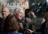 Retired Capt. Dale Dye, a decorated Marine veteran of the Vietnam War and senior military advisor on 'The Pacific,' speaks with media members on the red carpet at the Hollywood premiere of HBO's new 10-part miniseries.