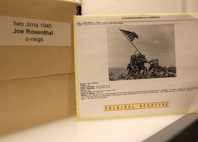 Associated Press photographer Joe Rosenthal’s photo of the flag raising on Iwo Jima is arguably the most famous news photograph in history. The original photo negative, which was taken Feb. 23, 1945, is preserved in the archives of the AP in New York.