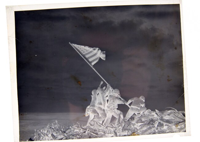Associated Press photographer Joe Rosenthal’s photo of the flag raising on Iwo Jima is arguably the most famous news photograph in history. The original photo negative, which was taken Feb. 23, 1945, is preserved in the archives of the AP in New York.