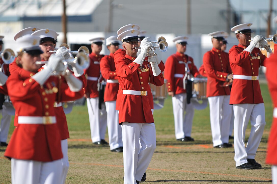 Sgt. Scott Pierce, soprano bugler with the U.S. Marine Corps Drum and Bugle Corps, performs during a dress rehearsal at the Marine Corps Air Station in Yuma, Ariz., on Feb. 24, 2010. The Marine Corps Battle Color Detachment, made up of the Drum and Bugle Corps, the Marine Corps Color Guard and the Silent Drill Platoon, kicked off its annual spring tour in Yuma on Feb. 26-27 with performances on the air station and at two local high schools. Based in Washington, D.C., the Marines spend several weeks rehearsing in Yuma's mild winter each year before touring.