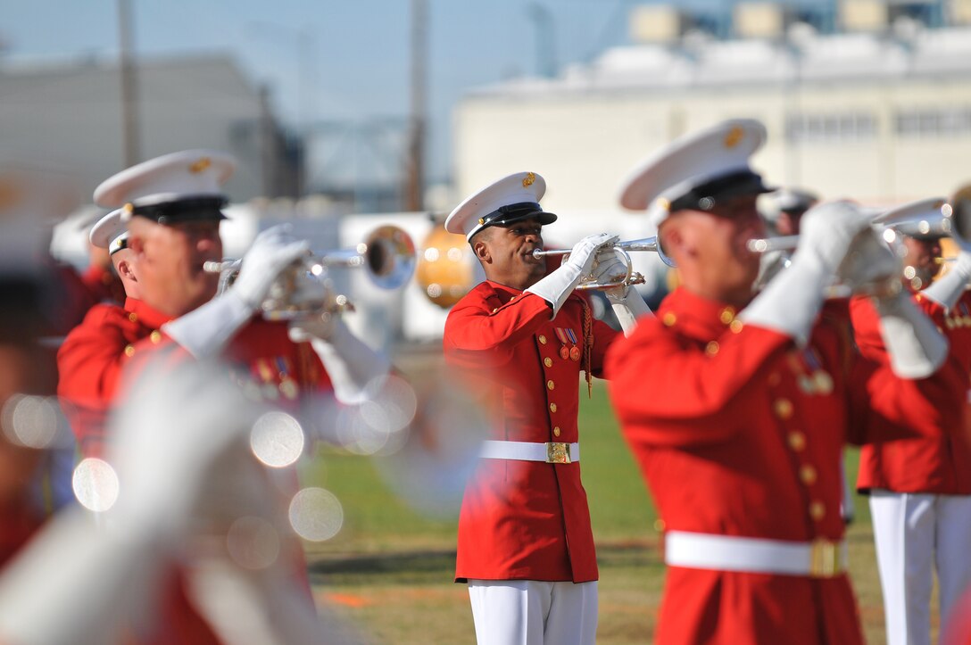 Cpl. Richard Anderson, soprano bugler with the U.S. Marine Corps Drum and Bugle Corps, performs during a dress rehearsal at the Marine Corps Air Station in Yuma, Ariz., on Feb. 24, 2010. The Marine Corps Battle Color Detachment, made up of the Drum and Bugle Corps, the Marine Corps Color Guard and the Silent Drill Platoon, kicked off its annual spring tour in Yuma on Feb. 26-27 with performances on the air station and at two local high schools. Based in Washington, D.C., the Marines spend several weeks rehearsing in Yuma's mild winter each year before touring.
