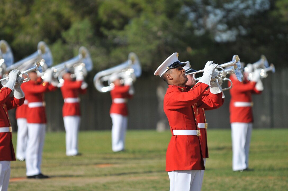 Cpl. Richard Anderson, soprano bugler with the U.S. Marine Corps Drum and Bugle Corps, performs during a dress rehearsal at the Marine Corps Air Station in Yuma, Ariz., on Feb. 24, 2010. The Marine Corps Battle Color Detachment, made up of the Drum and Bugle Corps, the Marine Corps Color Guard and the Silent Drill Platoon, kicked off its annual spring tour in Yuma on Feb. 26-27 with performances on the air station and at two local high schools. Based in Washington, D.C., the Marines spend several weeks rehearsing in Yuma's mild winter each year before touring.