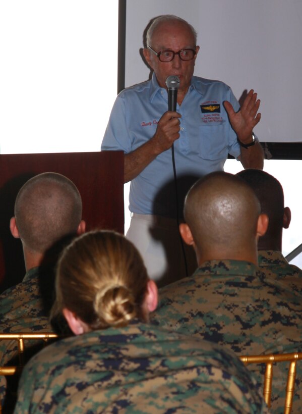 Retired Navy Capt. Charles "Davy" Crockett, a member with The Chosin Few, Aloha Chapter, gives a Korean War presentation to service members with U.S. Marine Corps Forces, Pacific, Feb. 25 at the Sunset Lanai, Camp H.M. Smith, Hawaii. Crockett was a Pilot during the Korean War.