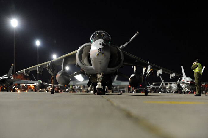 NELLIS AIR FORCE BASE, Nev. -- Crew members assigned to Royal Air Force Cottesmore, United Kingdom, prepare the GR-9 Harrier for a night training mission during Red Flag 10-3 Feb. 23, 2010. Red Flag is a realistic combat training exercise involving the air forces of the United States and its allies. The exercise is conducted on the 15,000-square-mile Nevada Test and Training Range, north of Las Vegas. (U.S. Air Force photo by Tech. Sgt. Michael R. Holzworth/RELEASED)
