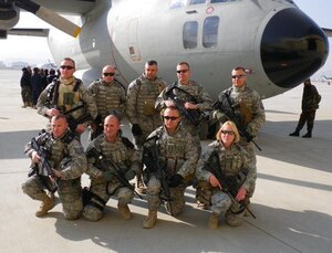 KABUL, Afghanistan -- Senior Master Sgt. Chuck Klein (top right) is deployed from Headquarters Air Combat Command A4F1 to Kabul Afghanistan International Airport. Sergeant Klein is a flight line maintenance superintendent. (Courtesy photo)