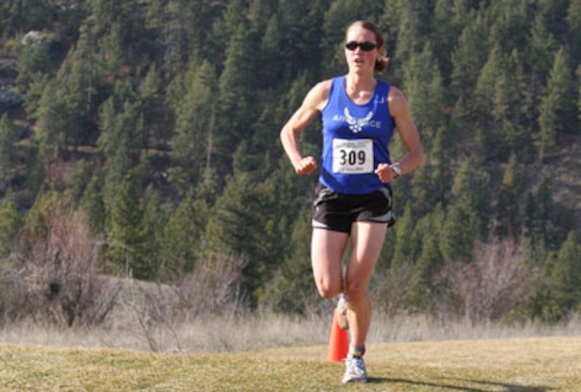 2nd Lt. Caroline White, from the 80th Operations Support Squadron, Sheppard Air Force Base, Texas, won the race with a time of 29:27, a pace of 5:55 minutes per mile. (U.S. Air Force photo by Stephen Brown)