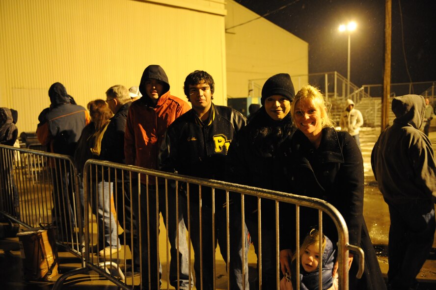 DYESS AIR FORCE BASE, Texas -- Family members of deployed Dyess Airmen, wait for their loved ones to return. The Airmen, who are assigned to the 317th Airlift Group, spent four months in Southwest Asia in support of Overseas Contingencies Operation. (U.S Air Force photo by Airman 1st Class Shannon Hall)