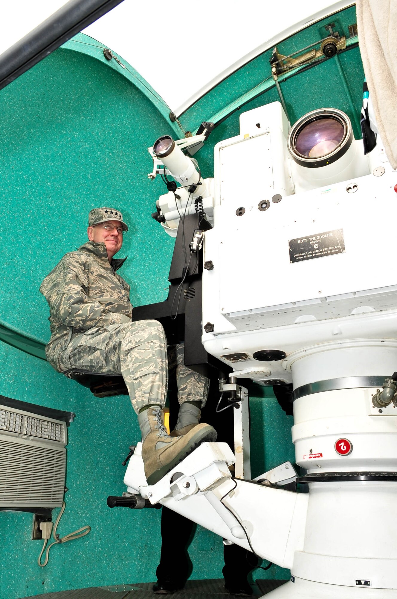 Gen. C. Robert Kehler, commander of Air Force Space Command, sits in a cinetheodolite during a visit to Cape Canaveral Air Force Station Feb. 19. General Kehler visited the Cape on his return to AFSPC headquarters from the Air Warfare Symposium and Technological Exposition in Orlando. Cinetheodolites are used to track the trajectory of a launch vehicle in flight. (U.S. Air Force photo/Jennifer Macklin