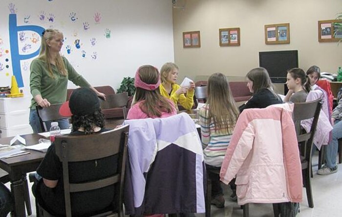 Susan Smith-Parry, Red Cross of Northern Utah, safety and health instructor, introduces herself to students attending a class on baby sitter skills at the Hill Air Force Base Youth Center on Feb. 20. 