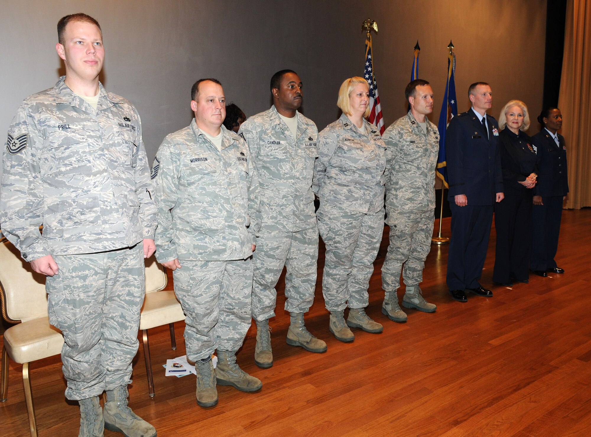 Tech. Sgt Dan Prill, Master Sgt. Hugh Morrison, Senior Master Sgt. James Candler, Capt. Shauna Kenyon and Capt Shane Huff received a commander's coin at the 927th Air Refueling Wing quarterly commander's call for their help at the Human Resource Development conference.  (U.S. Air Force photo/Tech. Sgt. Denise Hauser)