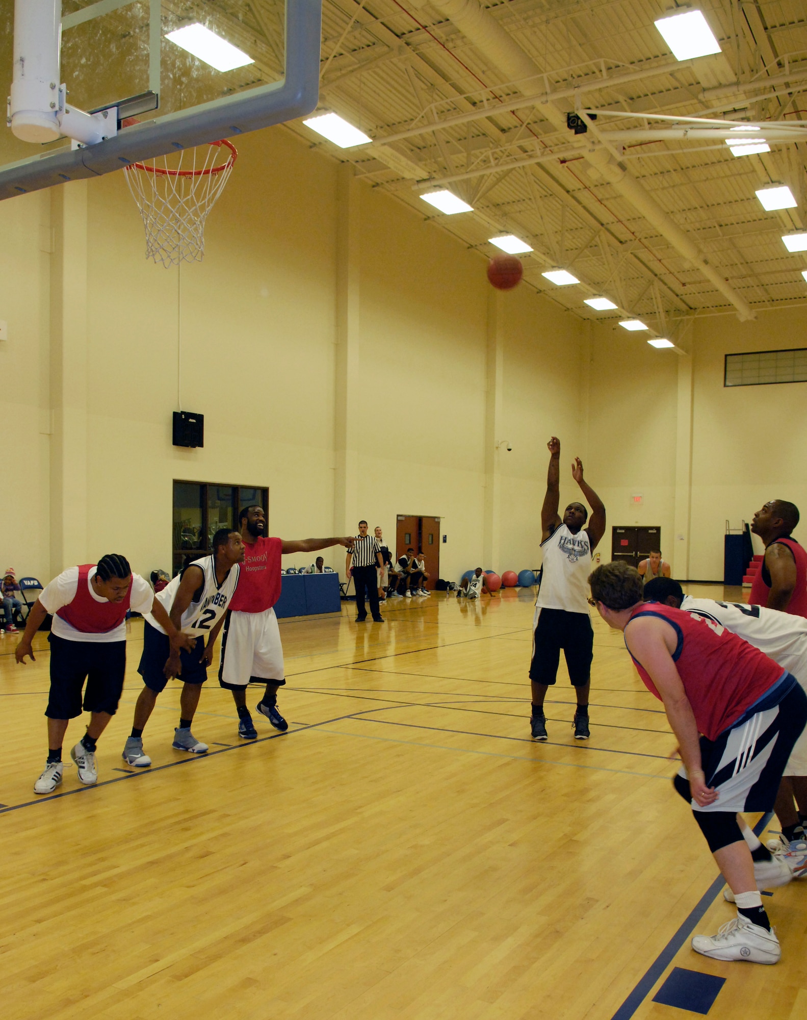 VANDENBERG AIR FORCE BASE, Calif. -- Trevor Wiggins, from the 30th Security Forces Squadron team, throws up his first of two free throws during an intramural basketball game here Tuesday, Feb. 23, 2010. The SFS team dribbled around the Old Guys team, winning 53-38. (U.S. Air Force photo/Airman 1st Class Andrew Lee) 
 

 
 