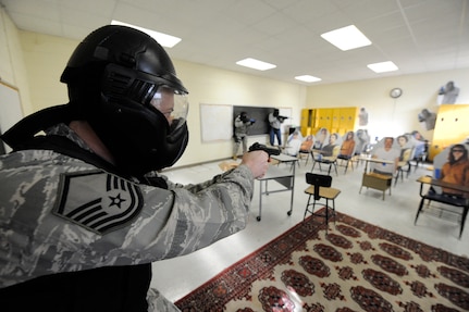 U.S. Air Force Master Sgt. David Dalbec, clears a room during the Active Shooter Training Course in Mt. Pleasant, S.C., Feb. 23, 2010. The AST course prepares first responders on how to react to a hostile situation. Sergeant Dalbec is an combat arms instructor with the 148th Fighter wing Duluth, Minn. (U.S. Air Force photo by James M. Bowman/released)

