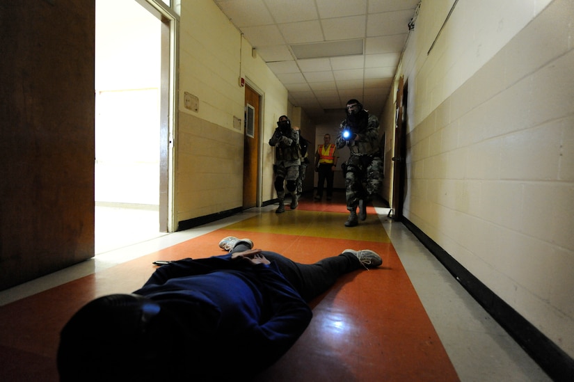 U.S. Air Force Chief Master Sgt. Tim Winfree (left) and Tech. Sgt Bradley Krause subdue an aggressor during a mock hostile situation at the Active Shooter Training Course at Mt. Pleasant, S.C., Feb. 23, 2010. The AST course prepares first responders on how to react to a hostile situation. Chief Winfree is the 50th Mission Support Group superintendent and Sergeant Krause is the NCIOC of training with the 50th Security Forces, both are from Schriever AFB, Colo. (U.S. Air Force photo by James M. Bowman/released)


