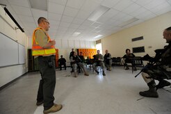 Nick Minzghor briefs participants on upcoming activities prior to starting the  Active Shooter Training Course at Mt. Pleasant, S.C., Feb. 23, 2010. The AST course prepares first responders on how to react to a hostile situation.  Mr. Minzghor is the lead instructor of AST. (U.S. Air Force photo by James M. Bowman/released)