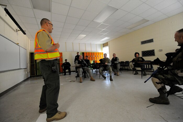 Nick Minzghor briefs participants on upcoming activities prior to starting the  Active Shooter Training Course at Mt. Pleasant, S.C., Feb. 23, 2010. The AST course prepares first responders on how to react to a hostile situation.  Mr. Minzghor is the lead instructor of AST. (U.S. Air Force photo by James M. Bowman/released)
