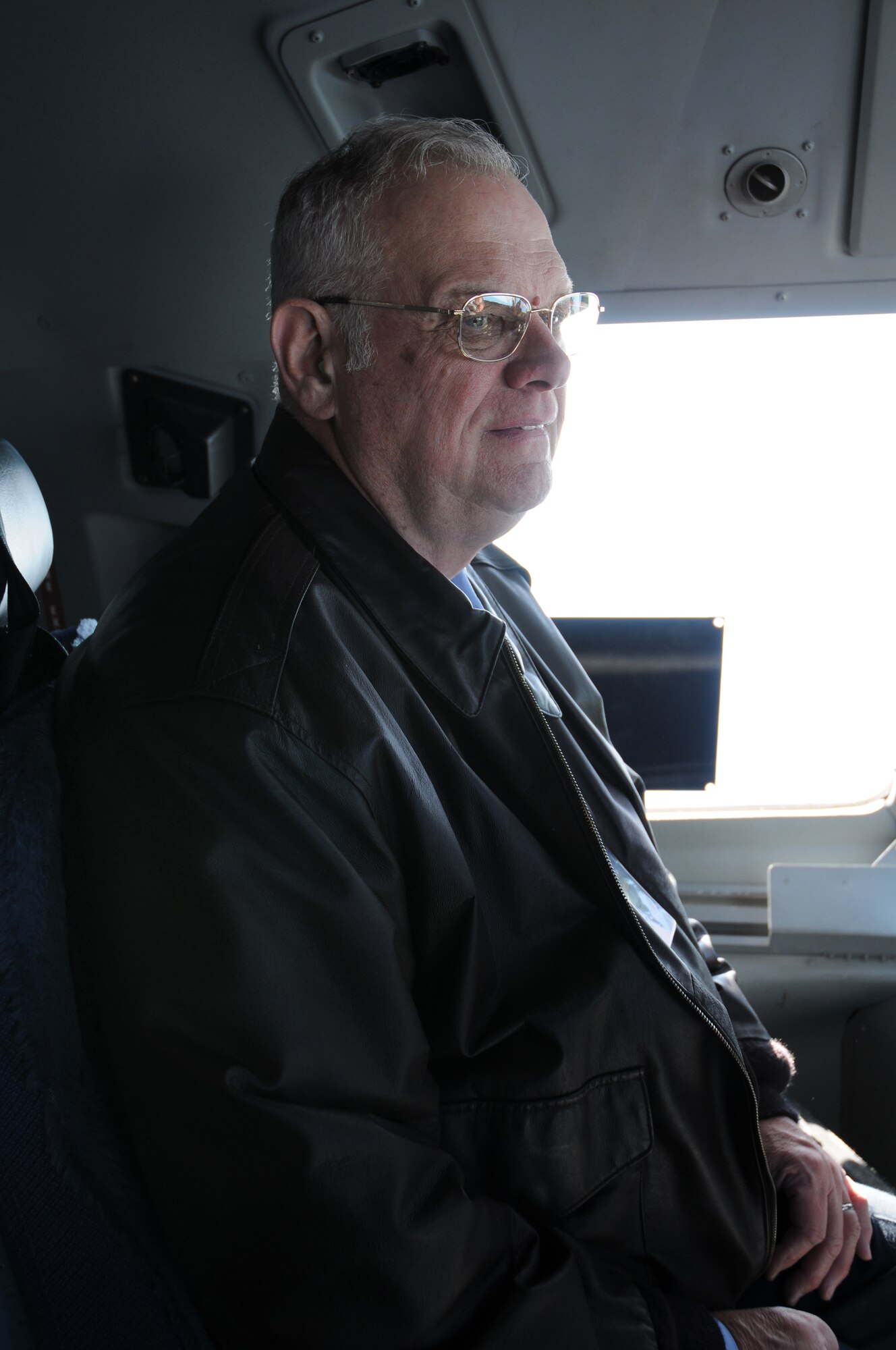 The Honorable Carleton Carey, mayor of Dover, observes the view from the flight deck of a C-17 Globemaster III as part of the 512th Airlift Wing's Civic Leader Tour Feb. 18-19 to Dobbins Air Reserve Base, Ga., and Keesler Air Force Base, Del. Mayor Carey had the opportunity to witness the aerial view of Dover during the return trip landing. (U.S. Air Force photo/Capt. Marnee A.C. Losurdo)