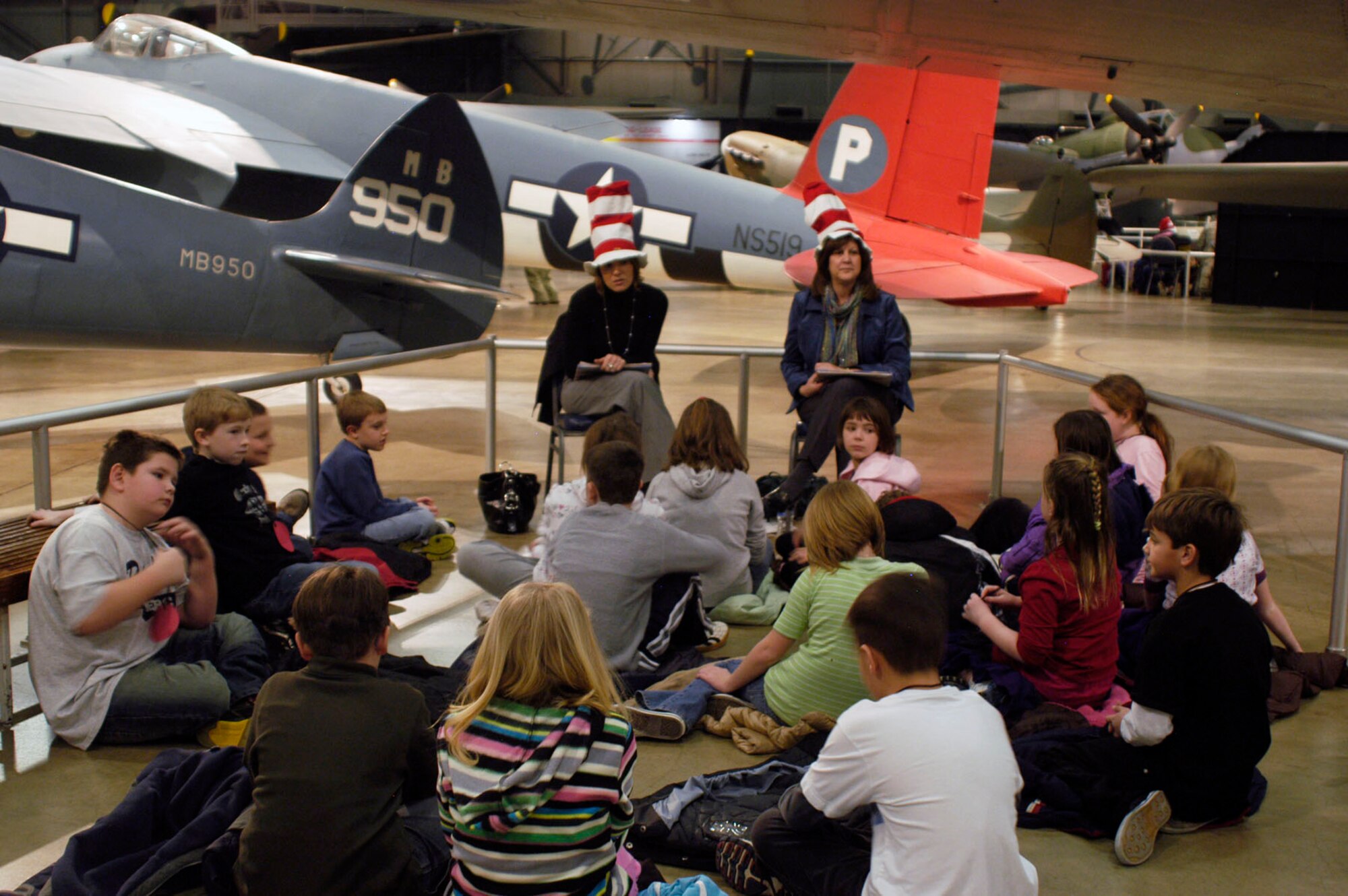 DAYTON, Ohio -- More than 1,000 second- and third-graders from the Dayton area participated in Read Across America at the National Museum of the U.S. Air Force on Feb. 25-26, 2010. Various reading stations were set up around the museum, and volunteers from Wright-Patterson Air Force Base read aviation-related stories during the national celebration, which takes place each year around Dr. Seuss' birthday. (U.S. Air Force photo)