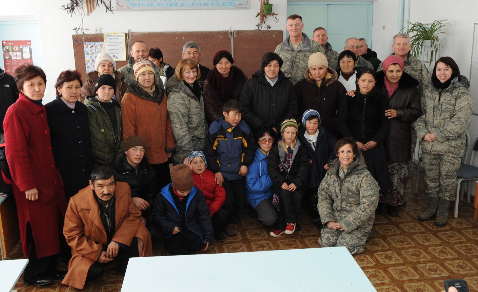 Maj. Gen. Polly Peyer, WR-ALC?commander, and other AFMC senior leaders  gather for a photo with teachers and schoolchildren in Kyrgyzstan. Courtesy photo