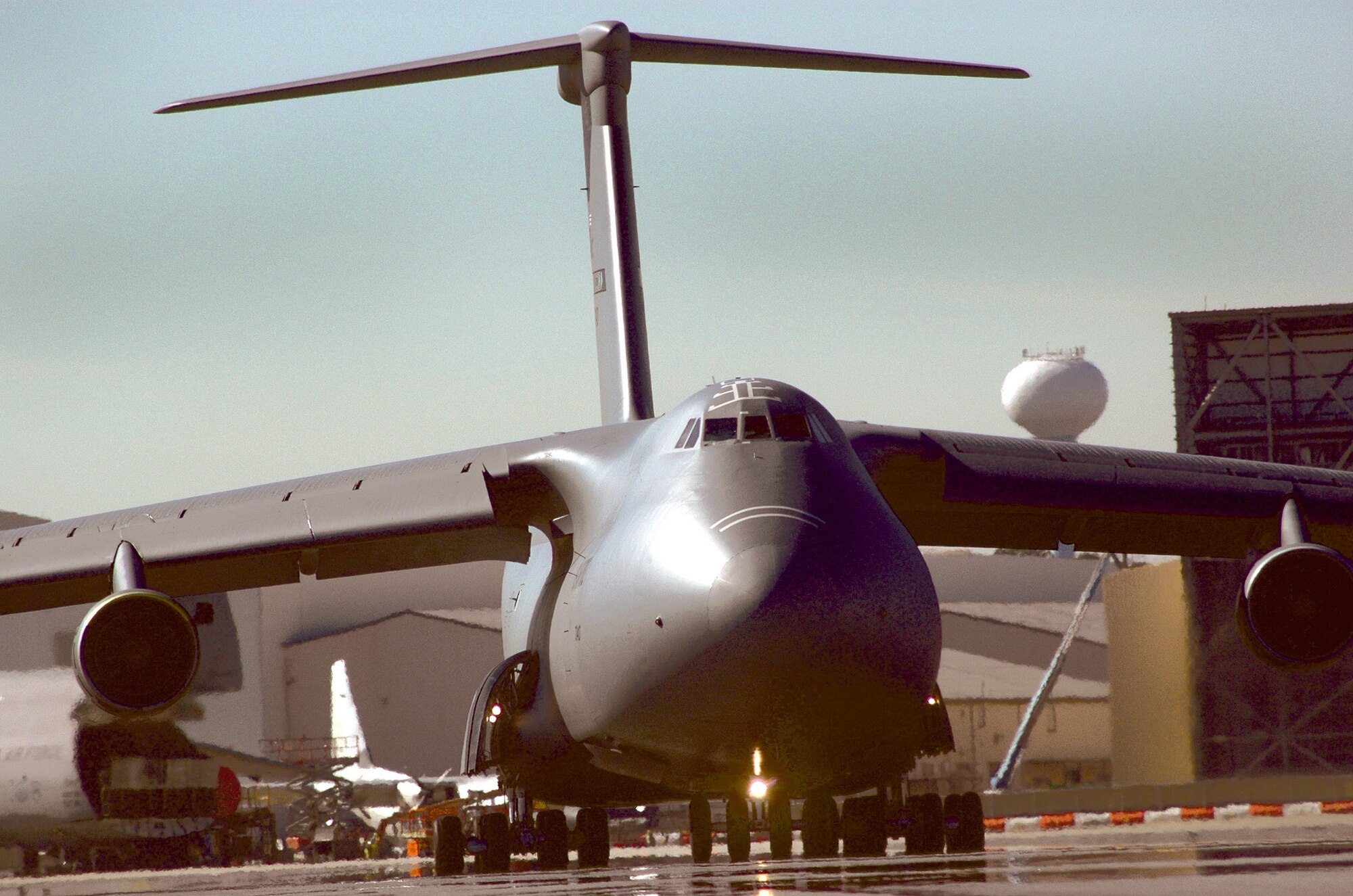 A C-5  taxis onto Robins runway. U. S. Air Force photo by Sue Sapp