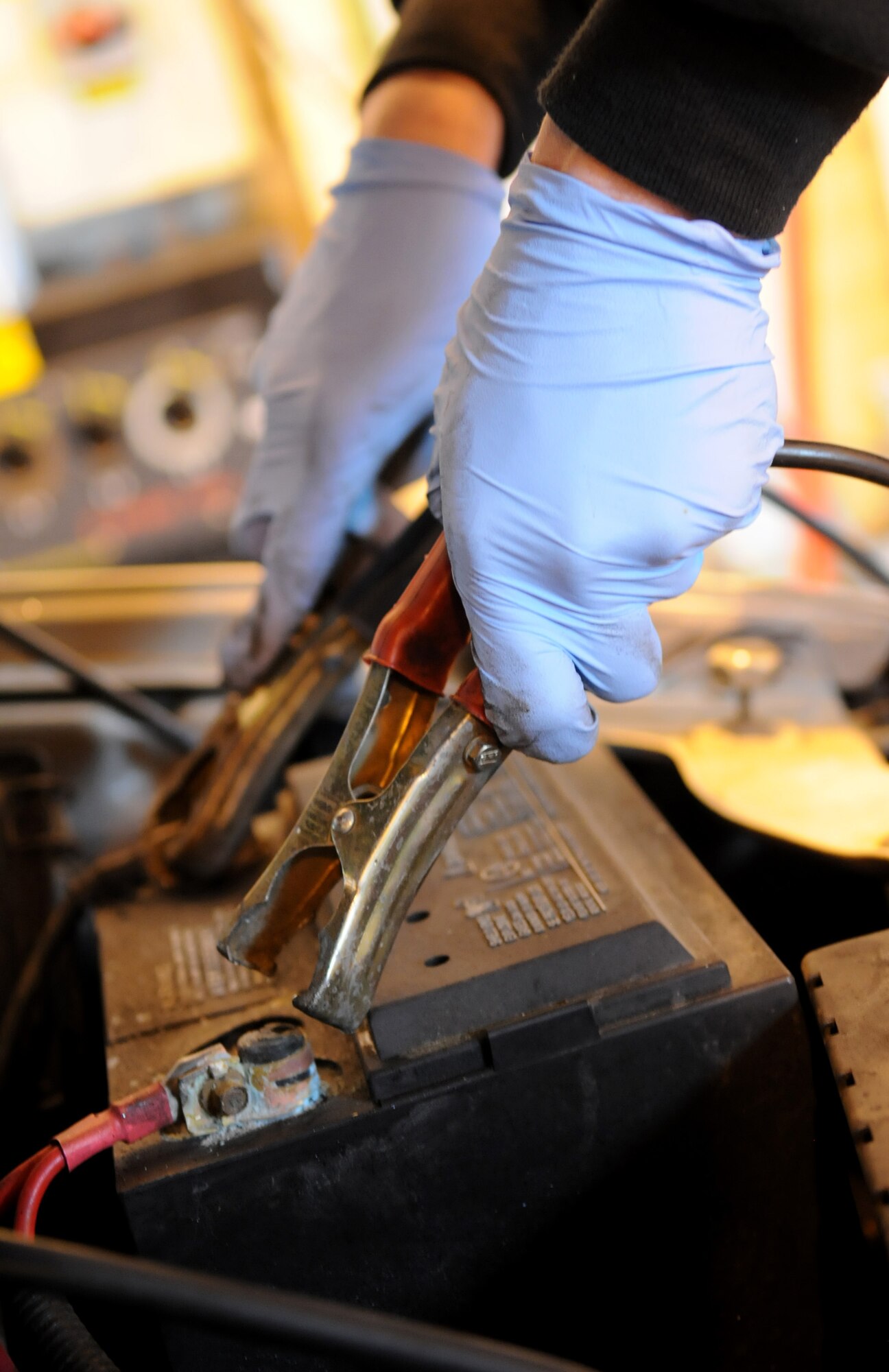 RAF MILDENHALL, England – Brian Muse, volunteer mechanic, tests a car battery during a tune up at the Auto Hobby Shop Feb. 24. (U.S. Air Force photo/ Staff Sgt. Jerry Fleshman)