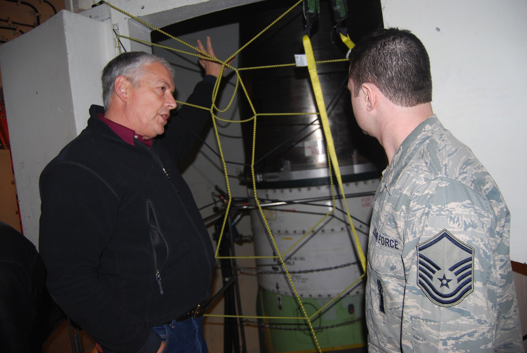 Nick Kaufman, a member of Leadership Montana, asks Master Sgt. Richard Hamill, 341st Maintenance Operations Squadron team training superintendant, a few questions about the Minuteman III during a tour of the missile training facility Feb. 18.(U.S. Air Force photo/Airman 1st Class Kristina Overton)