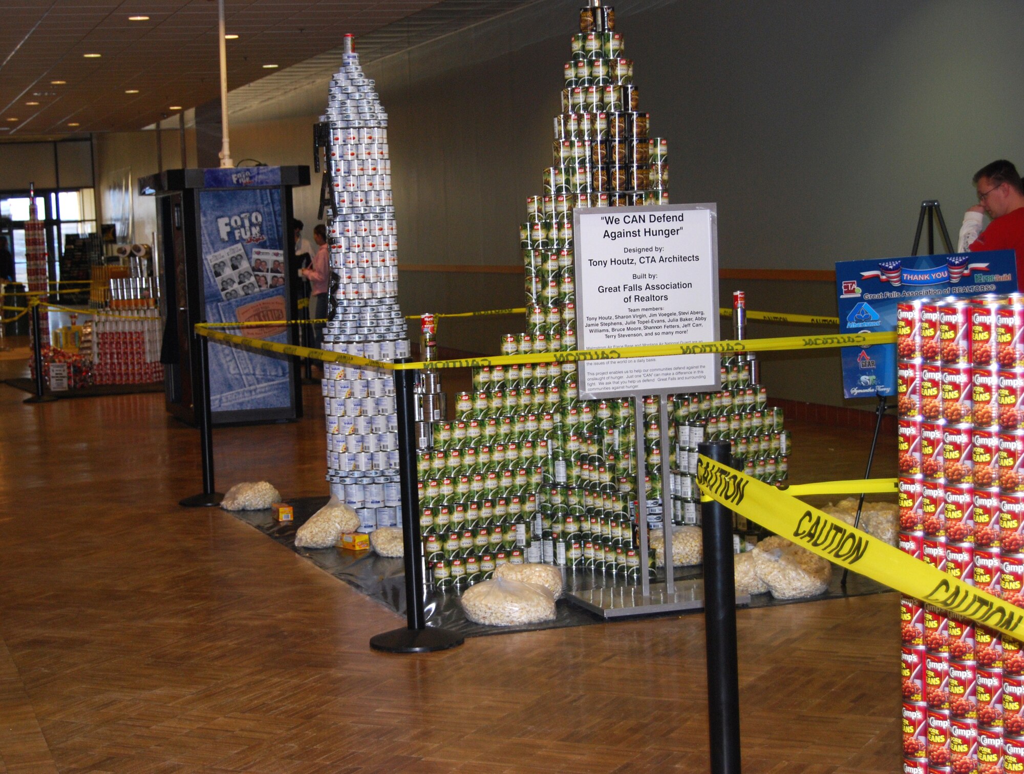 The Great Falls Association of Realtors built a replica of an F-15 Fighter and an ICBM missile for the CANstruction project in the lower level of the Holiday Village Mall Feb. 19. (U.S. Air Force photo/Airman 1st Class Kristina Overton)