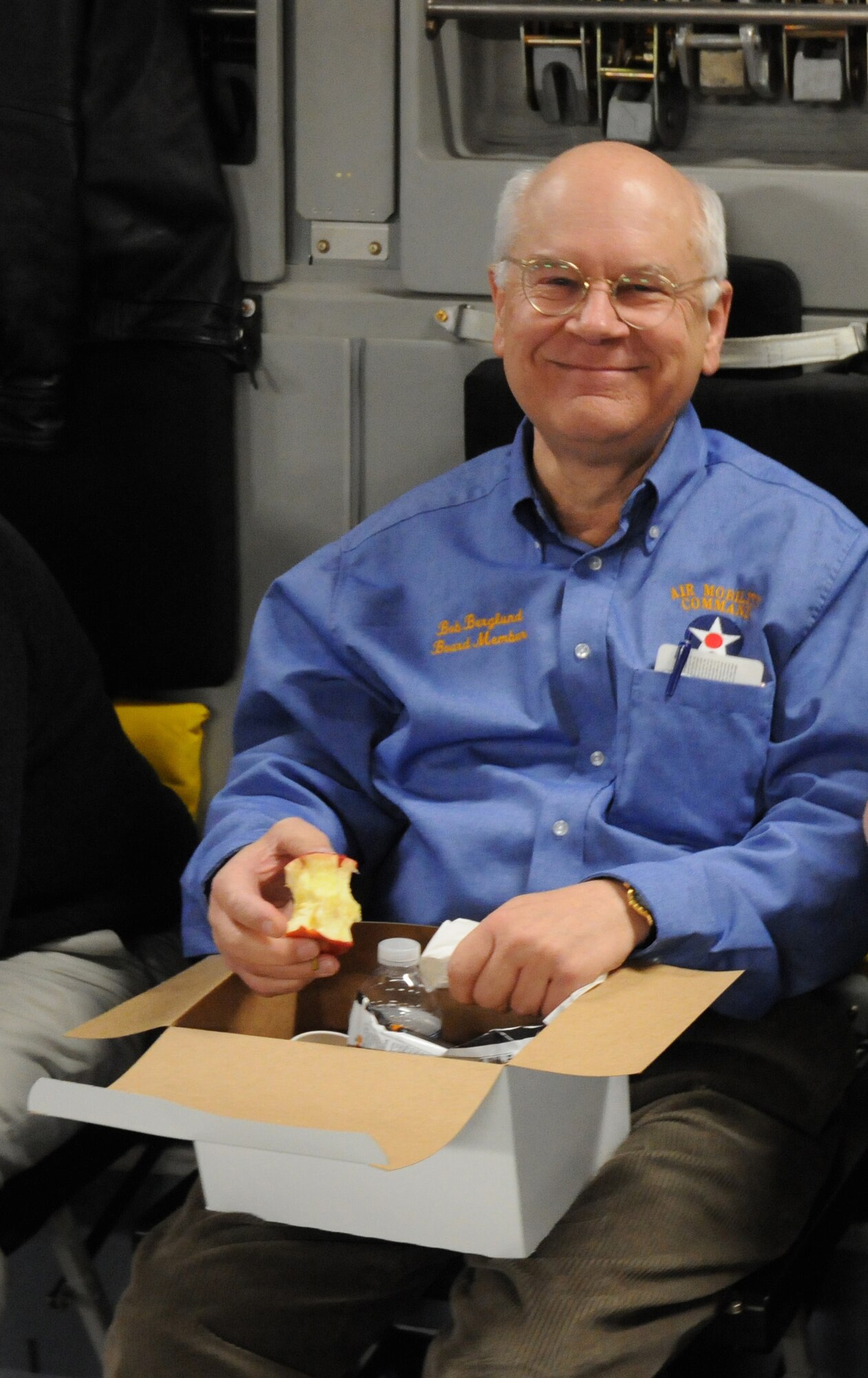 Robert Berglund, Central Delaware Chamber of Commerce Military Affair Committee member, enjoys a box lunch aboard a C-17 Globemaster III as part of the 512th Airlift Wing's Civic Leader Tour to Dobbins Air Reserve Base, Ga., and Keesler Air Force Base, Miss. Mr. Berglund, who's also a board member of the Air Mobility Command Musuem, is one of 19 civic leaders who participated in the two-day event. (U.S. Air Force photo/Capt. Marnee A.C. Losurdo)