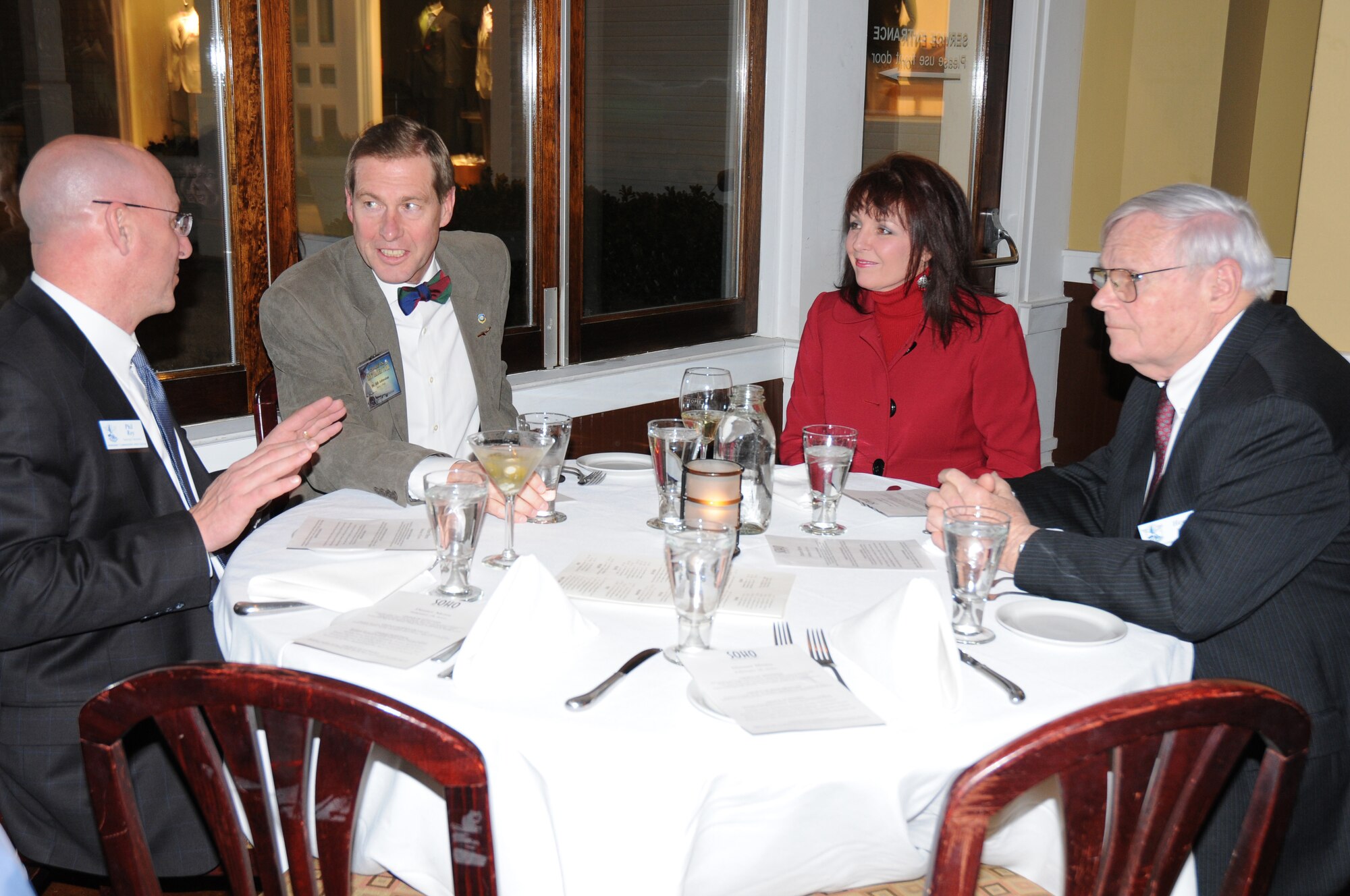 Dr. Bill Johnston (second from left), Wesley College president, socializes with civic leaders from the Atlanta area Feb. 18 as part of the 512th Airlift Wing's Civic Leader Tour to Dobbins Air Reserve Base, Ga., and Keesler Air Force Base, Ga. Dr. Johnston is one of 19 civic leaders from Dover and surrounding areas, who participated in the two-day tour. (U.S. Air Force photo/Master Sgt. Veronica A. Aceveda)