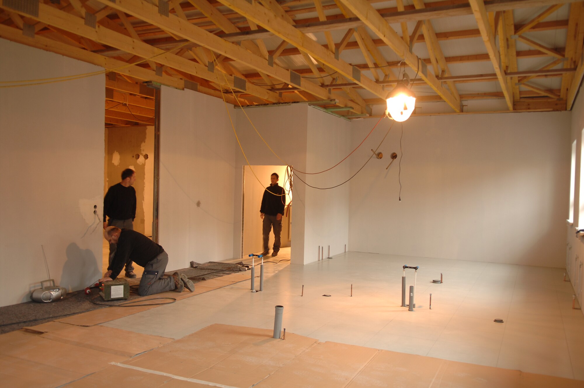 Contractors work on Building 301A which is currently under final phases of construction at Ramstein Air Base, Germany will become the workcenter for the 15 personnel who currently work at the Sembach Area Dental Laboratory, Sembach Annex, Germany. The dental laboratory on Sembach is relocating as the Air Force prepares to turnover control of the Annex to the U.S. Army. (U.S. Air Force photo by Tech. Sgt. Michael Voss)