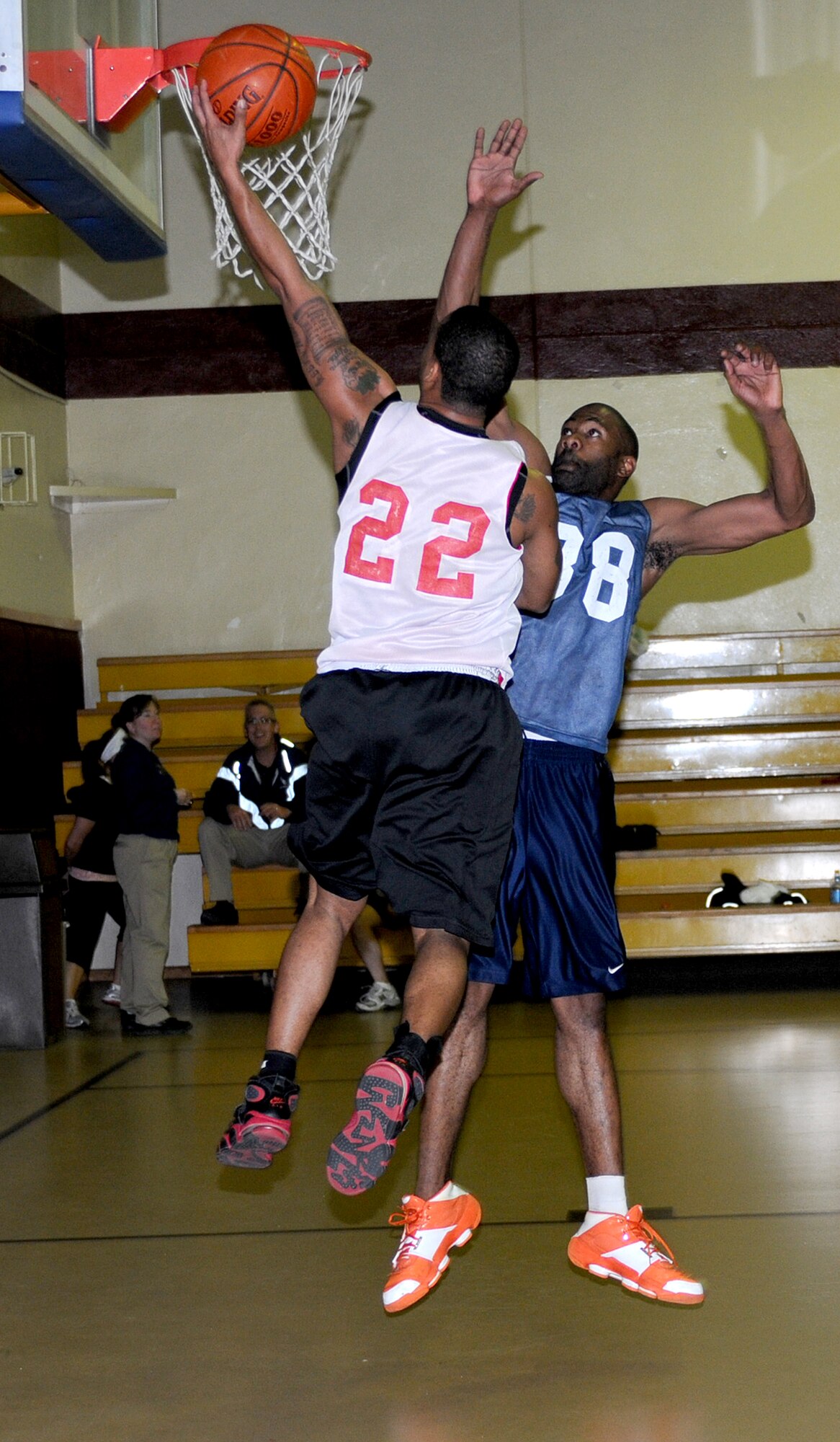 Staff Sgt. Maurice Walker, 39th Logistics Readiness Squadron, performs a lay-up over a 39th Security Forces Squadron team member during an intramural basketball game Monday, Feb. 22 at Incirlik Air Base, Turkey. The 39th SFS team squeaked by the 39th LRS team 54-53 in the championship game Feb. 23. (U.S. Air Force photo/Senior Airman Alex Martinez)
