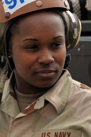 NELLIS AIR FORCE BASE, Nev. -- Seaman Apprentice Kandice Jones, an aircraft structural mechanic, is deployed to Red Flag 10-3 from Electronic Attack Squadron 209, Andrews AFB, Washington, D.C. This is her first Red Flag and she maintains the EA-6B Prowler with fellow Sailors from VAQ-209 and Naval Air Station Whidbey Island, Wash. (U.S. Air Force photo by Tech. Sgt. Chris Flahive)