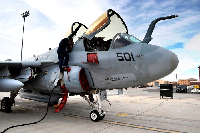 NELLIS AIR FORCE BASE, Nev. -- Naval aviation maintainers prepare an EA-6B Prowler for flight during Red Flag 10-3 Feb. 24. Red Flag is an advanced aerial combat exercise where aircrews from the U.S. and allied nations train in realistic aerial war scenarios over the Nevada Test and Training Range in southern Nevada. The Prowler is a long-range, all-weather aircraft with advanced electronic countermeasures capability. (U.S. Air Force photo by Tech. Sgt. Chris Flahive)